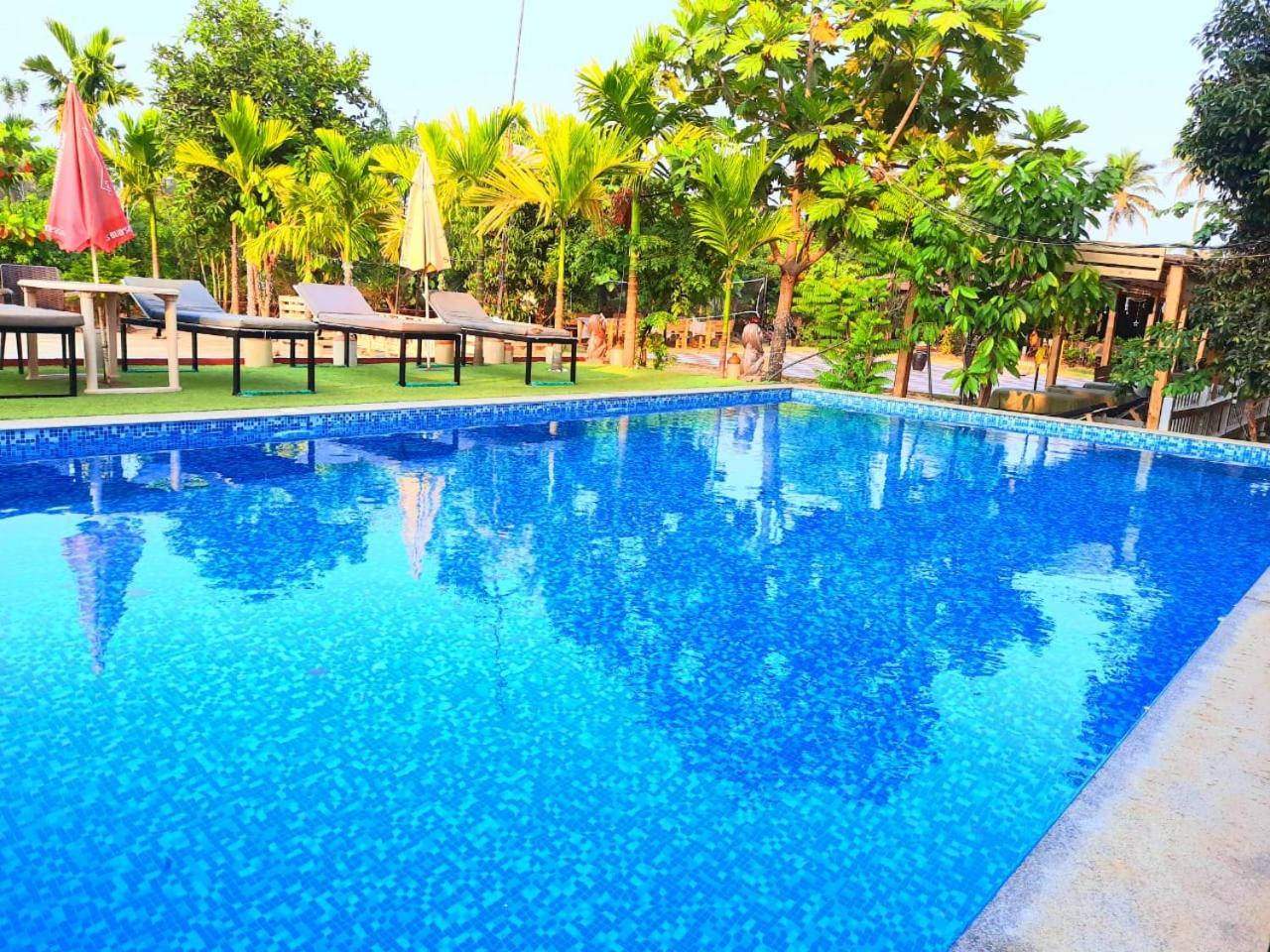 Go Green Spice & Eco Resort Cavelossim Luaran gambar